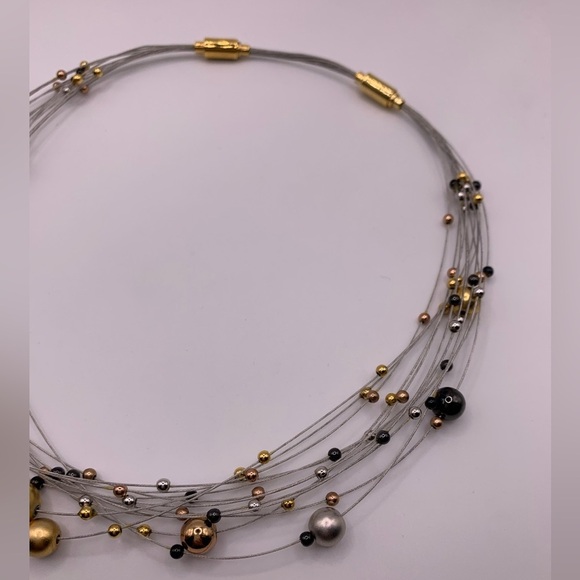 Funky multi strand adjustable necklace with gold and silver tone beads - Picture 6 of 7